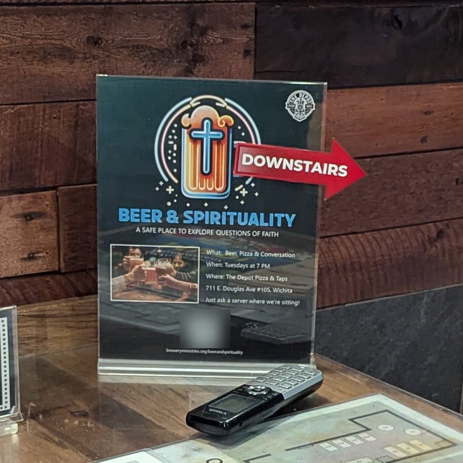 Our sign at the hostess stand showing where Beer & Spirituality is meeting